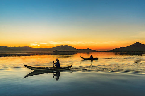 Back Boats On The Sunrise by Nguyet Le
