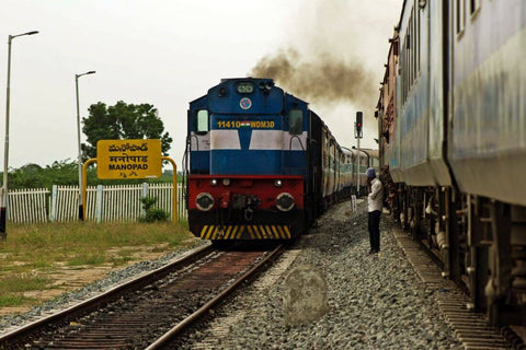 A Train Leaving Manopad in India - ALCO WDM3 Train Engine by Pete