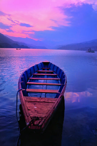 Boat At Phewa Tal Lake in Pokhara Nepal by Jeffry Juel