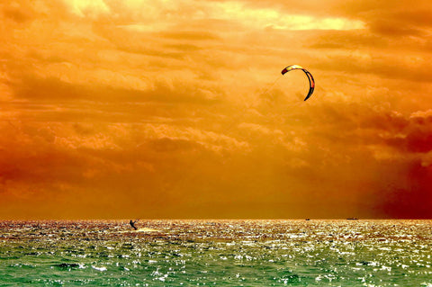Windsurfing Under A Fiery Noonday Sun - Canvas Prints by Stephen Llevares