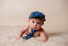 Adorable Baby In Blue Cap And Tie - Framed Prints