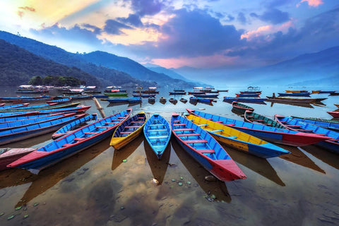Boats Moored At Phewa Tal lake in Pokhara Nepal by Jeffry Juel