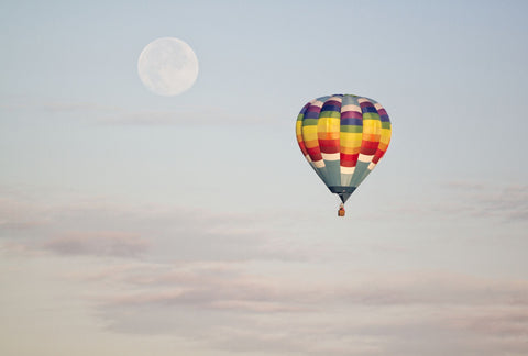 Colorful Hot Air Balloon In The Sky With Moon In The Background - Posters