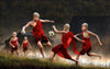 Young Monks Playing Football - Canvas Prints